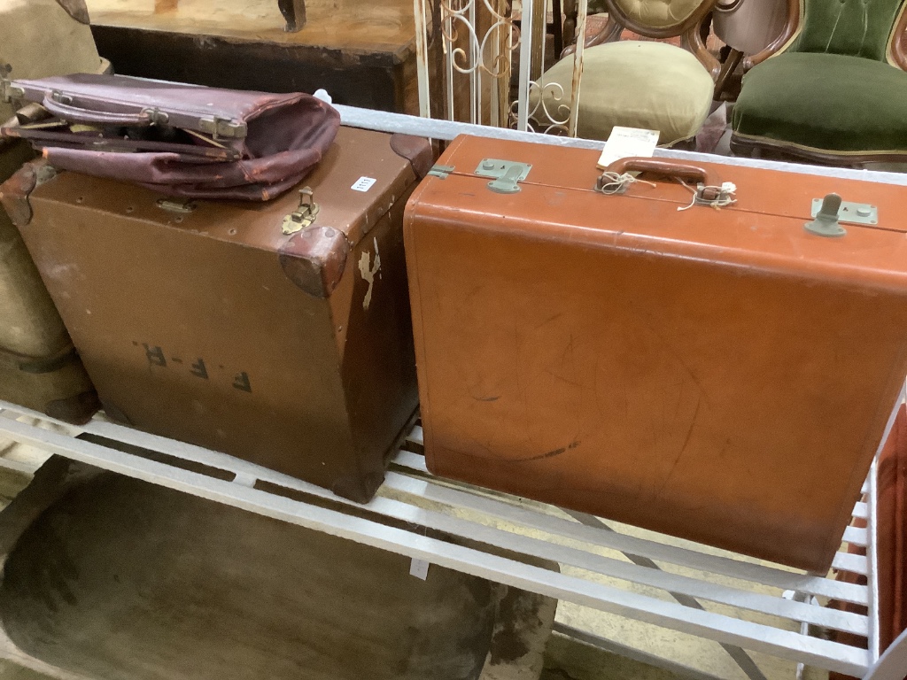 Three vintage suitcases and trunks